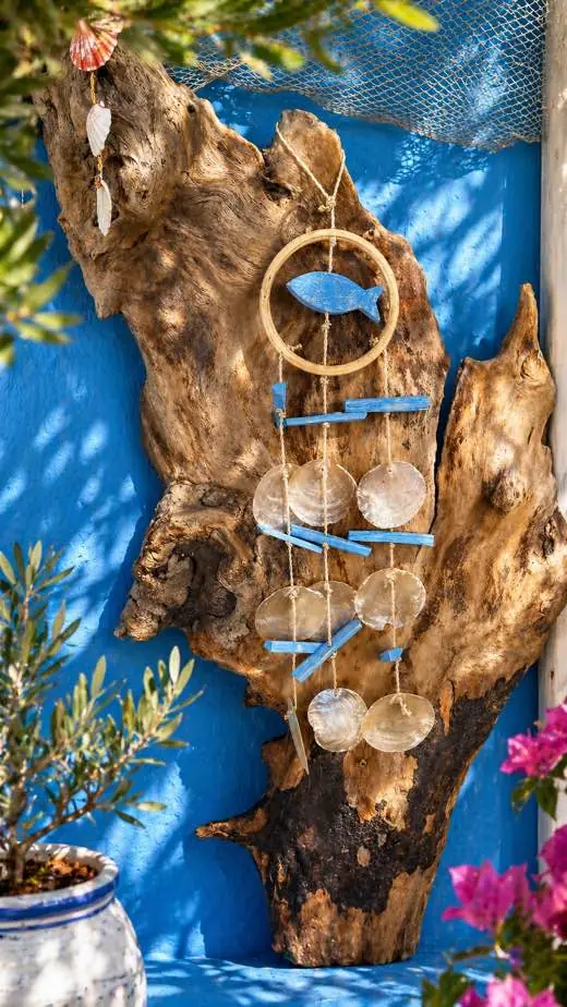 wooden sea decoration in the garden of Aristo restaurant